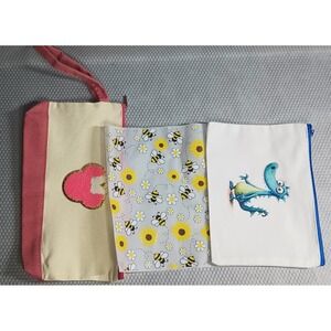 3 make-up bags ( 1- canvas w/strap and mickey head, 1 clear w/ bees & 1 canvas)
